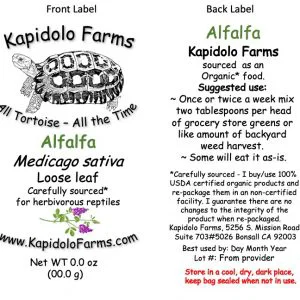 Front and back label for Kapidolo Farms Alfalfa seed packet. Front shows Kapidolo Farms with a tortoise illustration, the word Alfalfa, Medicago sativa, 'Loose leaf', and notes about being carefully sourced for herbivorous reptiles, plus the website. Back provides usage guidance for Alfalfa as reptile food, suggested amounts and frequency, storage and lot/best-by info, and the company contact/address.